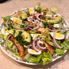 This recipe was good! I skipped the tomatoes and used goat cheese instead of blue, but it still came together well. I didn’t measure out the romaine, I just used an entire head. I’ll be making this again, but next time I’ll leave the boiled eggs out.