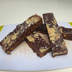 We make this slice vegan by using vegan butter and chocolate. We also don't add the meringue nests. You can make vegan ones but nobody has time for that and it's great without it! This slice is delicious 😋
