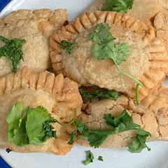 These parcels were tasty but I had loads of filling left. Half the recipe made 8 parcels but I had enough filling left for another 3-4 batches. It was impossible to use less dough for each parcel as they would not have been secure enough to fry. The dough was quite tough but the filling was good.