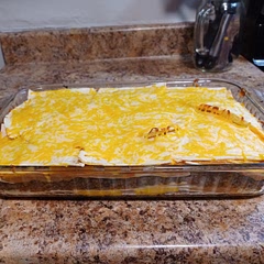 Came out nice. I cut up my tortillas in quarters to help fill corners of my baking dish. I would definitely next time add two cans of tomatoes only if you like tomatoes and one or two cans of black beans but how I made it tonight kid friendly definitely not a picky food.
