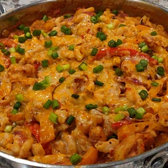 I used shrimp instead of chicken and chopped up and blended tomatoes instead of canned tomatoes. It was very creamy! Next time I wanna try using canned tomatoes so it gets more red!
