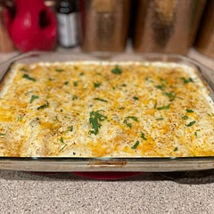 Added about a cup extra cheese, mixed in some Mexican blend cheese, and doubled the green chiles. Also added Penzey’s Southwest seasoning. Would be good with some onions. Very tasty! Cooked at 350 degrees.