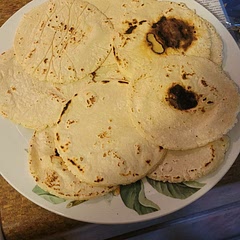Fantastic homemade tortillas. Forgot to add salt while mixing, so sprinkled with garlic salt while warm. Will definitely continue making these every time we want corn tortillas.