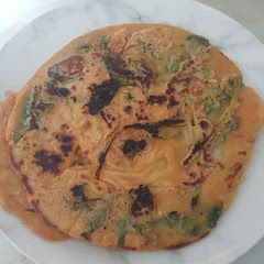 Added shredded kimchi, spring greens, spring onion, kale and spinach.  Also added Gochujang, pureed garlic and lemongrass to batter for extra taste.