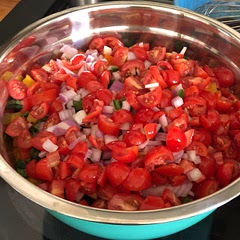 I sent my husband to the store and he bought grape tomatoes instead of Roma. Oh well. It all worked out. I also used a can of Mexican corn. I personally don’t like Cowboy Caviar but I heard it was really good from everyone that ate it.