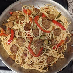 Delicious! Subbed the red wine for half balsamic vinegar half water, and used Field Roast Italian Sausage. Added zucchini in with the peppers and garlic.