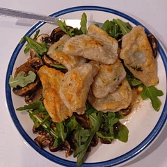 I had to fry the ravioli in olive oil. Simply boiling it does not cook it; the dough was still raw. The mushroom part was simple and I added baby arugula to the top. The spinach mix was too dry so I had to add soy milk.