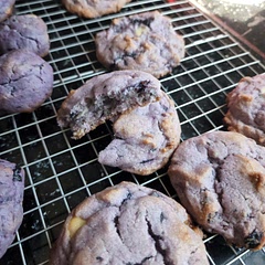 You can see my first try where I melted the butter with the blueberries and they didn't mix well with the rest but my second try looks great and all by hand, no mixer.