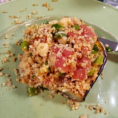 LOVED THIS! I searched all over town and could not find any tahini so I used sesame seed oil instead. I also added a lot of lime because I love it. There was more couscous than eggplant so I think next time I make it, I'll either reduce the couscous or add an eggplant.