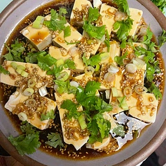 I love this - it’s super simple and flavorful (make sure you have a good quality chile oil!) Made it in less than ten min with the shelf stable mori nu firm silken tofu. Halved the recipe for only one package, used brown sugar because that was closest to me, and ate it with steamed rice. Love it as an easy summer dish. If you’re looking for chile oil - I love mala market’s (sold on their website).