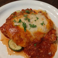 We really enjoyed this dish but I did definitely add more spices than noted on the recipe. I made the sauce similar to our family quick sauce recipe and paired the chicken with sauteed zucchini (hence the more water on the bottom).