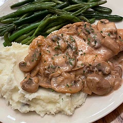 My recipe: easy breezy marsala that my kid loves. I pick out the mushrooms for her. Here I added oven roasted green beans as well.