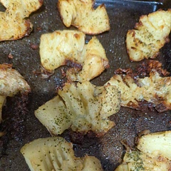 I microwaved 8 small white potatoes (NOT baby potatoes) then I cut them into quarters after they cooled and smashed them on my cookie sheet. I brushed on room temp butter and drizzled olive oil, seasoned with salt & pepper and parsley flakes. I cooked my potatoes for 45 mins as they were soft from the microwave.