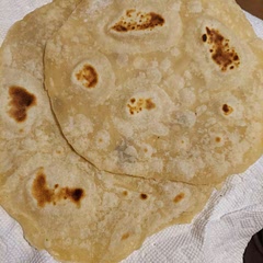 These are soft and buttery tasting. Good texture. Make sure to keep the pan hot enough while cooking so they puff up.