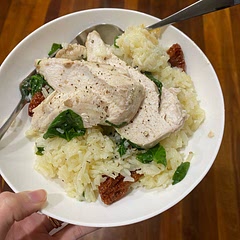 We had huge chicken breasts so doubled the rice and liquid. We also added sundried tomatoes and chopped fresh spinach in the last 5mins. Nice and simple, but tasty :)