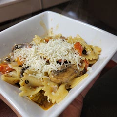 Added a little cheese on top! Converted the serving size to 6 and 3 cups of pasta water is a little much. Next time I'll be more slow to add as much.