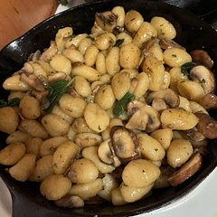 Added mushrooms. Cooked for 2-3 min before adding gnocchi back to pan.