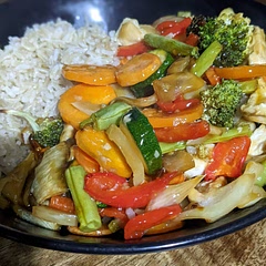 Added courgette and green beans, served with brown rice. Also added a spoonful of rice vinegar to the sauce as suggested by others. Really good!! Will definitely have again.
