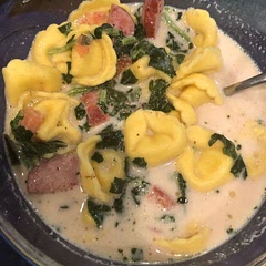 I make something similar to this. We use frozen tortellini, chicken broth, heavy cream, frozen spinach, smoked sausage, and diced tomatoes!