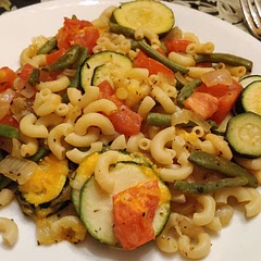 I used fresh green beans from my garden and I should have steamed them first or something because they were pretty under-cooked after following the directions in this recipe (but edible). It took me a little too long to make this for it to become a regular weeknight meal. But I really liked it! I added some extra cheese.