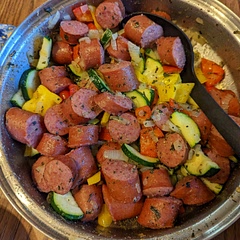 Very tasty! I did cook the onions with the sausage and then just added the vegetables in.