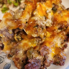It is just my husband and I.   I halved the recipe. I used Colby Jack/Monterrey Cheese mix instead of cheddar.  I added green chilis.  I've made a version of this with chicken also.  BTW...It's all gone...no leftovers because it was SO GOOD!