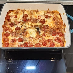 -Added an extra tin of cherry tomatoes on top and did 2 layers instead of 3.
-Added onions to sausagemeat sauce. 
-Very tasty.