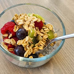 Added dairy free yogurt, almond granola, pomegranate, raspberries, grapes, kiwis, and blueberries.