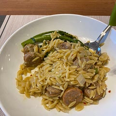 Very delicious! I only had raw sausage on hand so cooked in the oven first and then added to the dish. Orzo took a bit longer to cook, next time may cook separately and then add in.