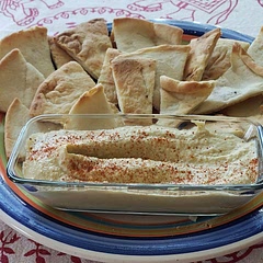 I add dill infused olive oil and cumin. Really liked this. Had a more basic recipe saved but this one includes all the tips and tricks I've learned over the years to make my favorite texture and humidity of hummus.