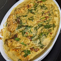 Swapped the heavy cream out for light cream cheese. Added more garlic and tomatoes than suggested, probably more spinach too, and used chicken broth for the orzo. Utterly amazing! Rich, creamy, just yum.