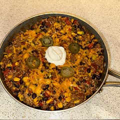 Makes a lot of food! Looks and smells amazing!!! Added sour cream and jalapeños for decoration