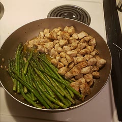 Served with Rice.  Mom loves asparagus,  but I would like to try it with broccoli or green beans
