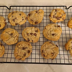 All I had was chocolate chips but these were still delicious. They are definitely sweet so you can cut back on the sugar if you're not a fan of overly sweet cookies. Bake time was 14 mins for soft center with firm, but not crunchy bottom.