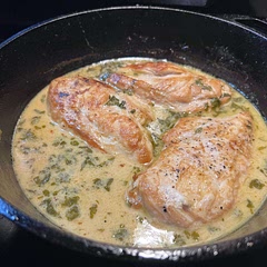 Cooked chicken in shifts because they were too big for the cast iron skillet.  I did not use onion because of an allergy, but was able to sub in some garlic infused olive oil and it was amazing.  Served with pasta and corn.