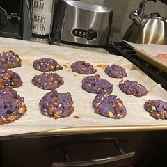 My dough ended up very dry and crumbly so I added a third cup more frozen blueberries and it came together very nicely. Very vibrant colours and very delicious and soft