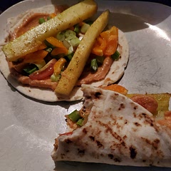 I used roasted red pepper hummus, and used green onions. Left out lettuce. I used orange peppers and grape tomatoes. It was a good, fast dinner. nice way to clean up fridge. Hubby isn't into eating dinner without meat, and he loved this.