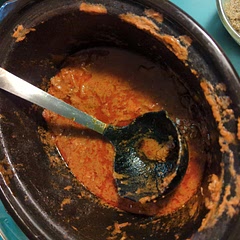 Use 1 tin of tinned tomatoes and don't add the water with the stock unless needed.