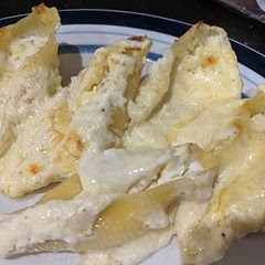 Very cheesy! Like others suggested, I used a bit less butter in the Alfredo sauce. Good comfort food, but very very rich

The pasta and cheese reheated ok, but the Alfredo sauce splits if you try to reheat this later