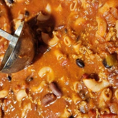 I added a can and a half of water, seasoned with Adobe and a bit of beef bouillion and added a handful of elbow macaroni.  Delish!