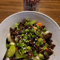 I steamed a bag of California blend veggies, put them on top of the rice, and added the beef mixture on top. I also made extra sauce mixture to pour on top! It was AMAZING!