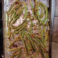 Would recommend tossing beans in oil alone before transferring to baking dish. THEN sprinkling on seasonings. The oil made the cheese clump and couldn't distribute evenly.