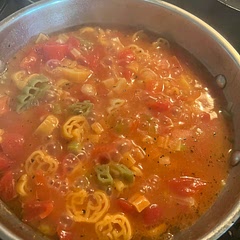 I added a little Italian seasoning. This photo is while cooking, afterward most liquid was absorbed. I use Fall shaped noodles from Aldi. Very good!