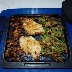 Air fried it with some green beans and some left over stuffing. Very good.