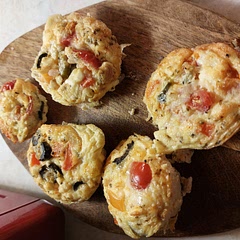 Really tasty, love the feta. Added olives as well. Spraying the muffin tin isn't really enough to prevent sticking, think I'll cut some squares of baking parchment to fill holes in future.