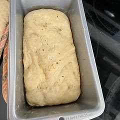 When I used this recipe I baked my bread for 25mins and put butter and garlic salt on the dough before going into the oven