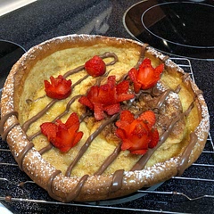 Wow this was so easy, fun and delicious.  Great recipe!  I’ve never had a Dutch Baby before.  I did mine with strawberries and Nutella.  Thanks!