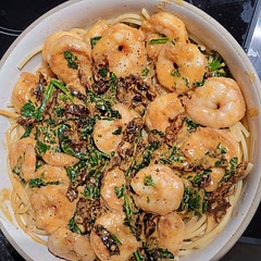 served over spaghetti and added some parmesan after this photo. loved this recipe but have discovered I do not love sun dried tomatoes, so I will probably substitute with mushrooms or possibly zucchini next time!