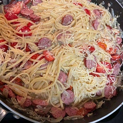 Super quick and easy to make. Definitely make sure you go back after a couple of minutes to stir the linguine or it will all be stuck together. I sautéed my tomatoes, sausage, garlic, and onions at the beginning.