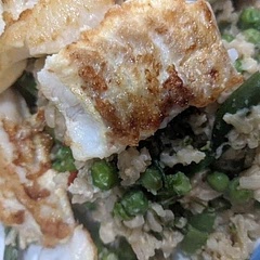 I felt like this was flavorless, except for the fish tasting like egg. I did mix some broccoli in with the rice, and that was the only thing that seemed to have any taste! I ended up adding a lot more tamari.

Also, use a really big pot for the rice! It doesn't sound like a lot of rice, but once all the vegetables are in there it's hard to stir.

These are pretty big servings.

If I were to make this again:
- use more tamari and spices (like, double)
- mix water in with the egg so it doesn't have such an eggy flavor
- start cooking the fish earlier - it took longer than I expected!